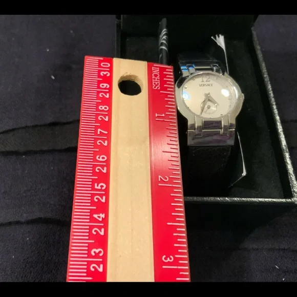 original VERSACE round silver face with black leather strap